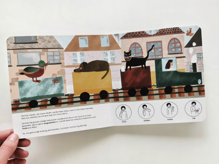 Babyzeichen Pappbilderbuch - Drei Tiere reisen mit dem Zug